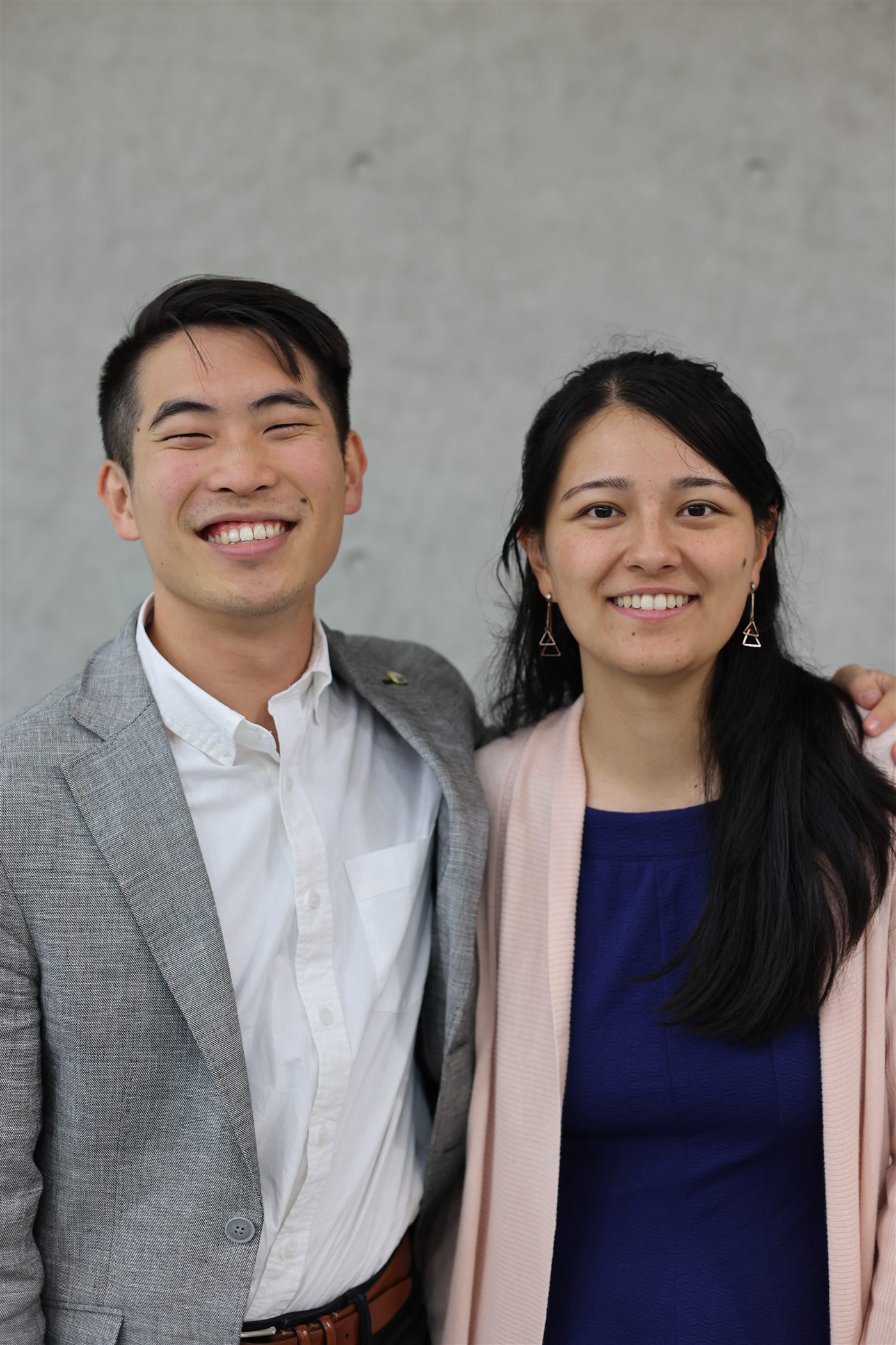 Co-pastors Jasmine and Mikuni Santoro smiling side by side